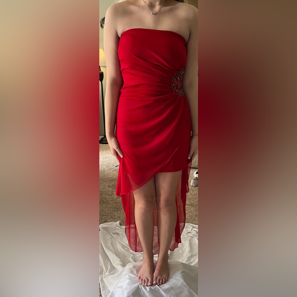 Red strapless mini dress with side beading